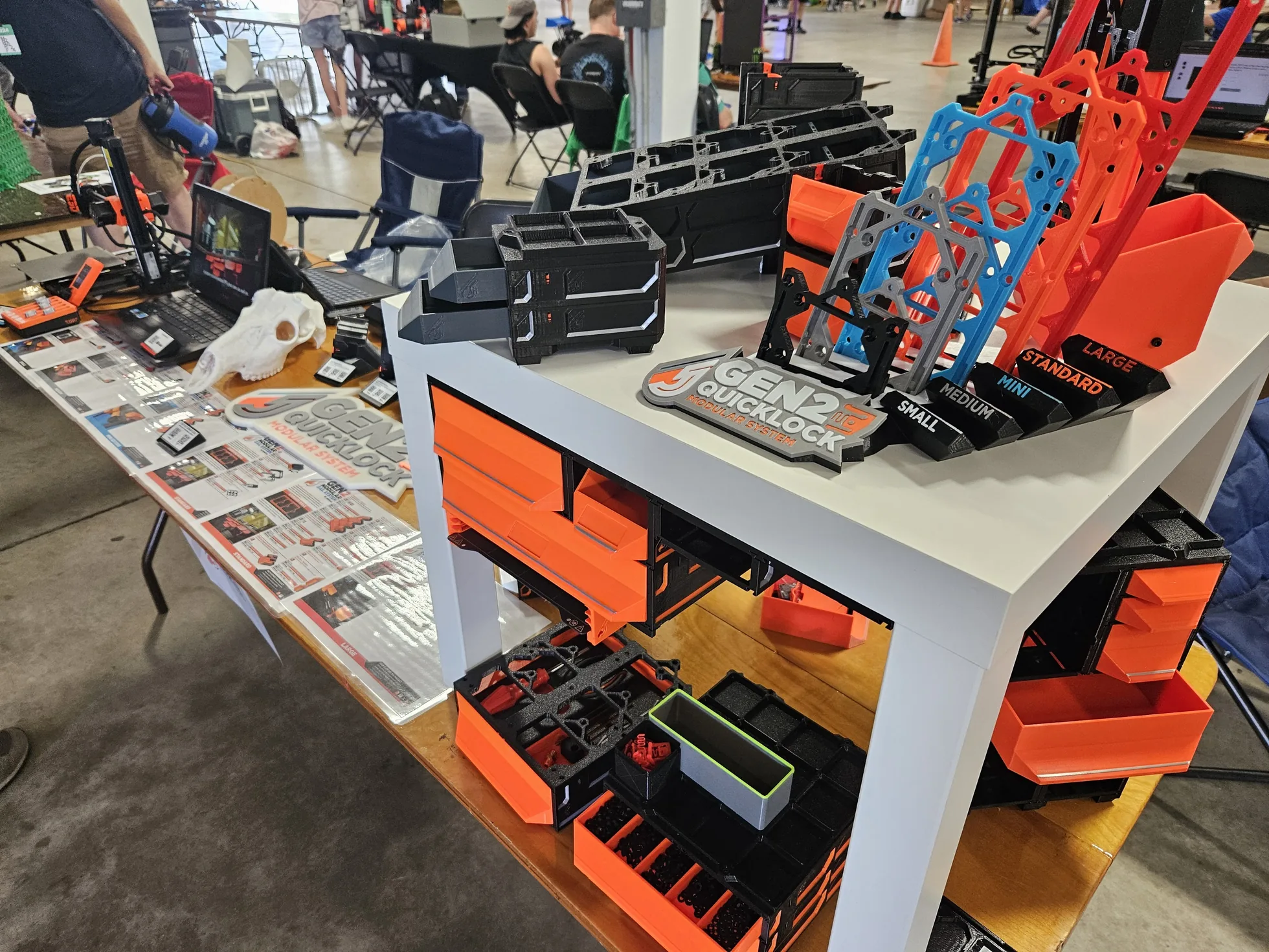 The table at MRRF, 2024 - kits out, sizes lined up, the leaflets going.