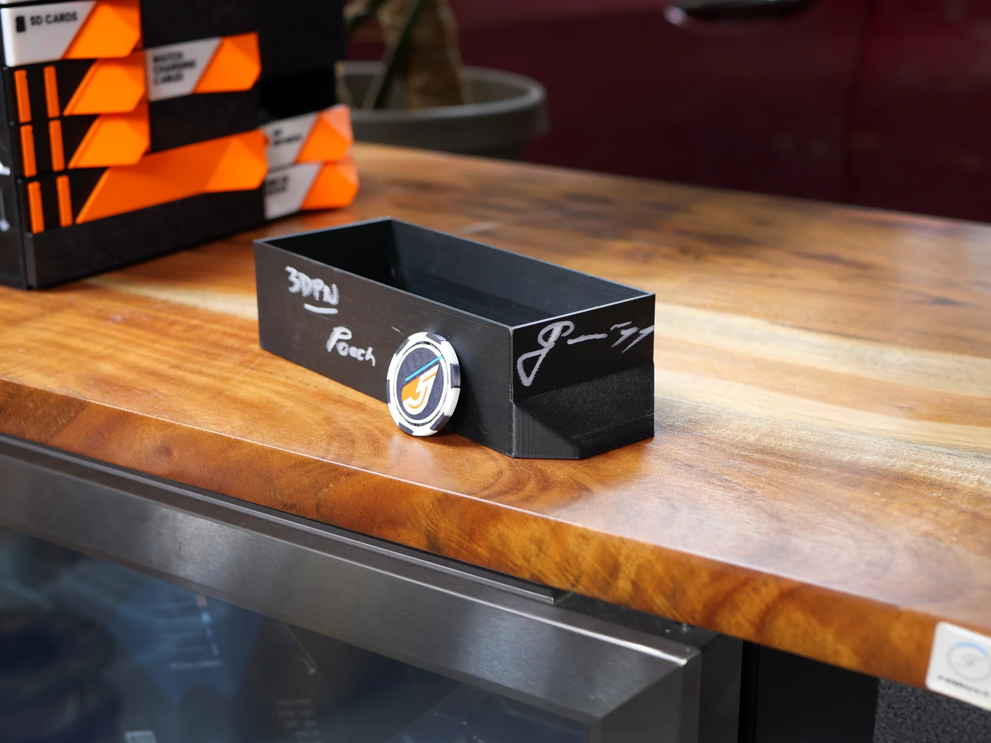 The original 2019 drawer on the bench, carrying its signatures.