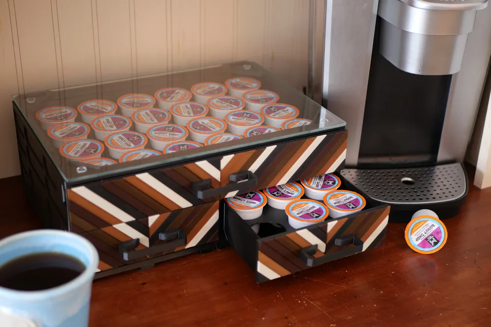 A MODULITH coffee station: drawers and open storage built around the machine.